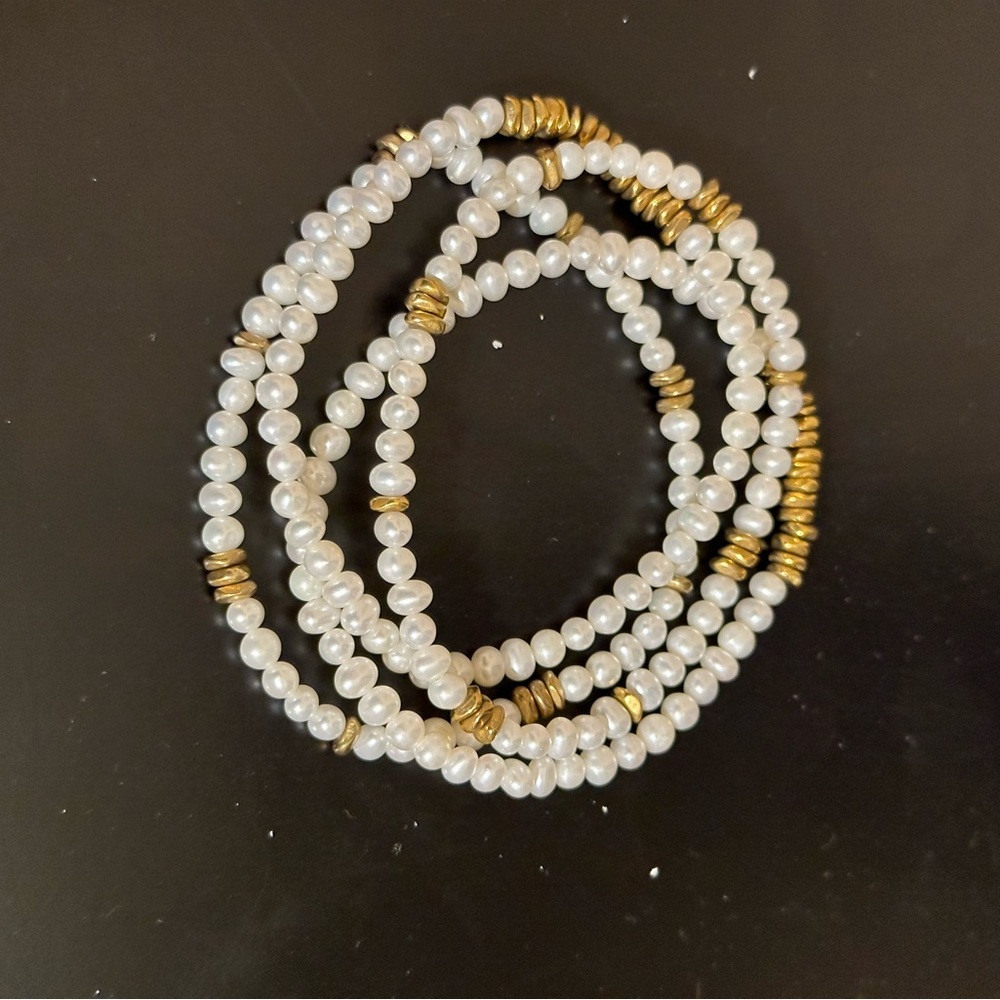 White and Gold Bracelets
